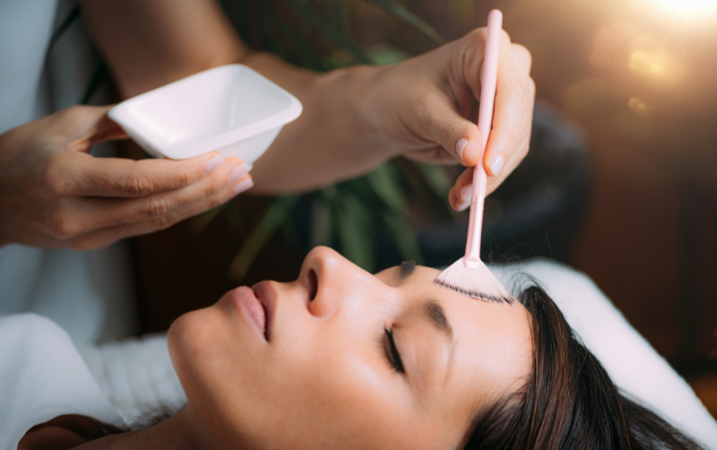 Patient receiving a custom facial.